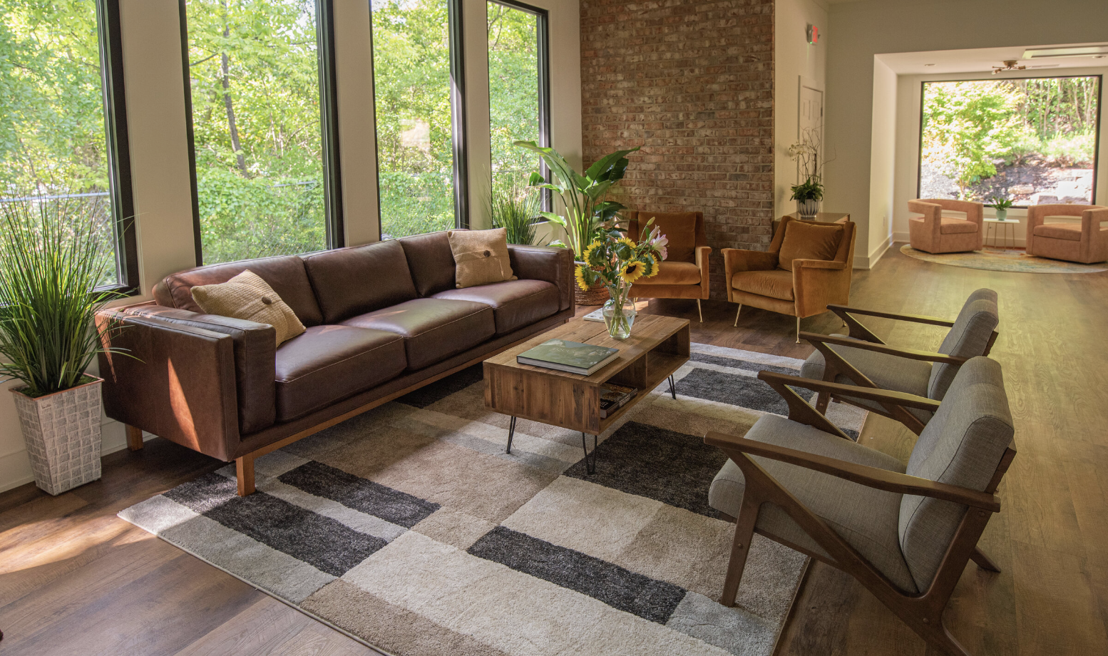The Career Harmony Lounge with conversational seating, plants, and natural light